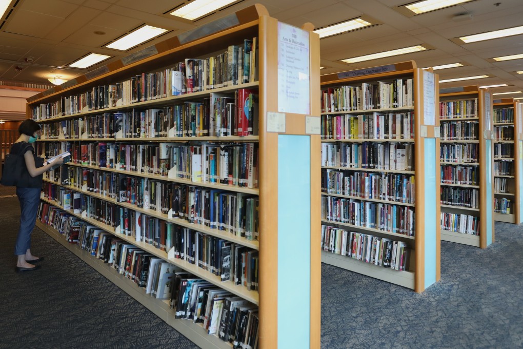 A woman reads at Hong Kong Central Library in Causeway Bay. Photo: Xiaomei Chen