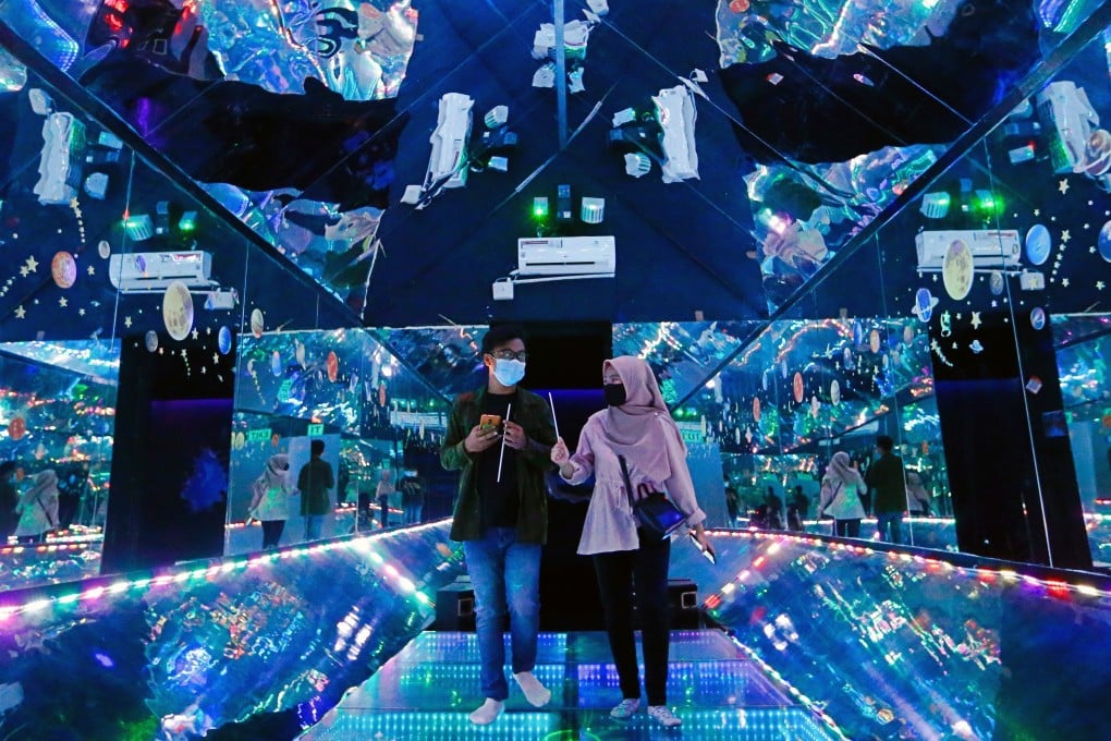 People visit the Magic Art 3D Museum amid the coronavirus outbreak in Jakarta. Photo: Reuters