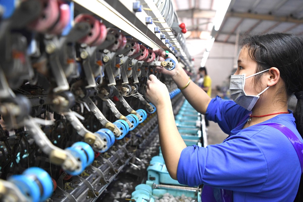 An employee at a silk reeling factory in Lingyun county in southern China's Guangxi Zhuang Autonomous Region on April 17, 2020. Photo: Xinhua/