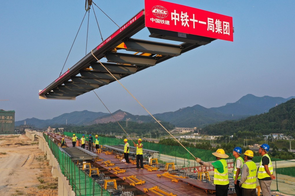 The decision by the Central Economic and Financial Affairs Commission, which is headed by President Xi Jinping, is a sign that China will continue to spend heavily on infrastructure projects, including high-speed railway lines, airports and warehousing. Photo: Xinhua