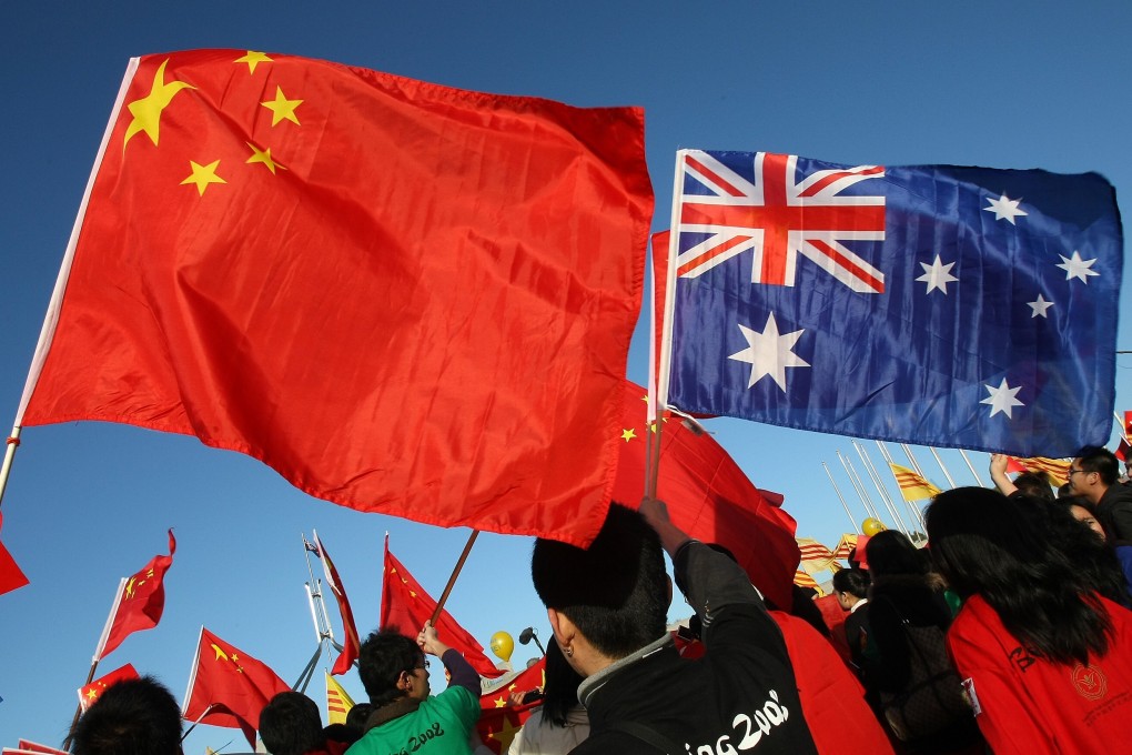 Thousands of Chinese supporters rally outside Parliament House during the Beijing 2008 Olympic torch relay through Canberra in 2008. Photo: AFP