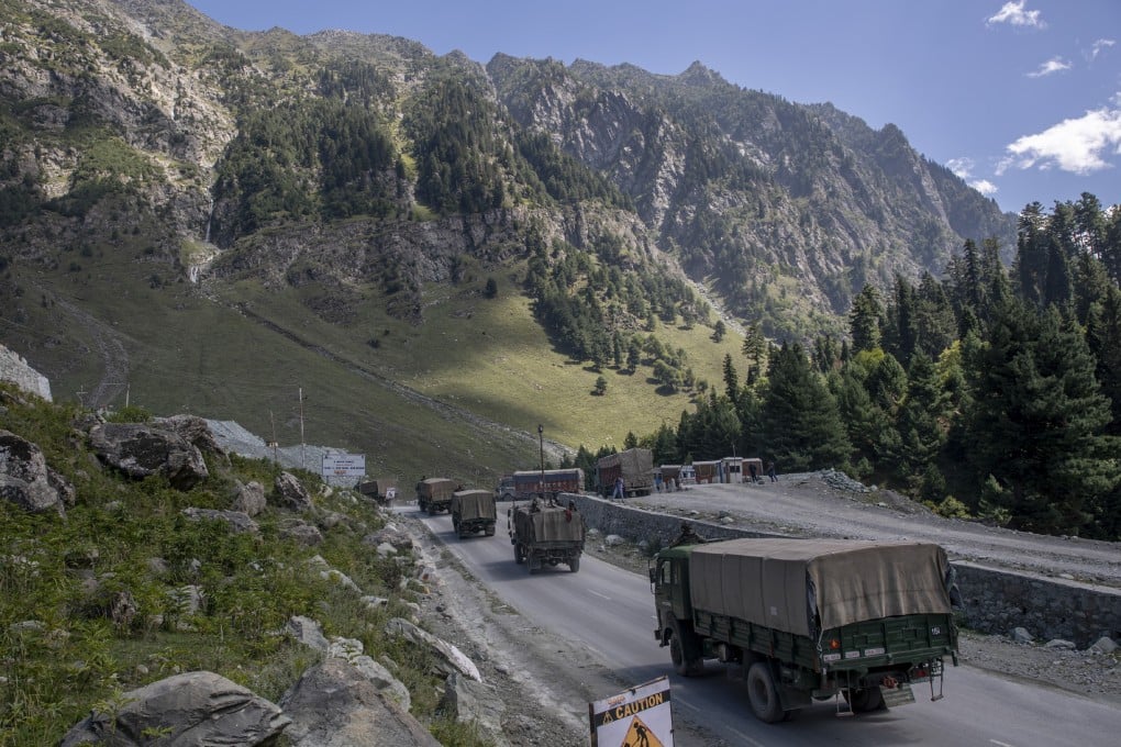 An Indian army convoy travels along a highway leading to Ladakh at Gagangeer in Kashmir on Wednesday. China and India have been engaged in a tense stand-off in the region since May. Photo: AP