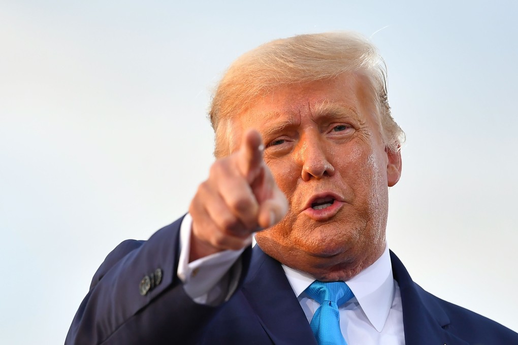 US President Donald Trump told journalist Bob Woodward that he was eager to play down the coronavirus outbreak so as not to alarm Americans. Photo: AFP