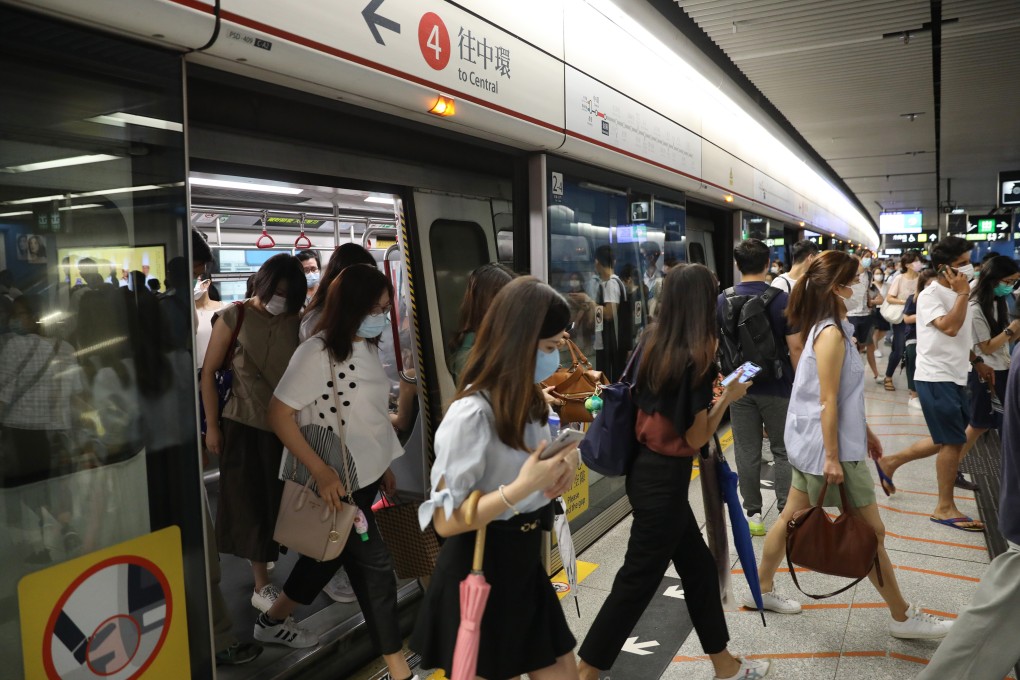 Commuters alight at Admiralty MTR station on August 19. Tracking human mobility and combining that data with epidemiological evidence can help cities pinpoint areas at risk of super-spreading events without having to shut down the entire city and its economy. Photo: Nora Tam