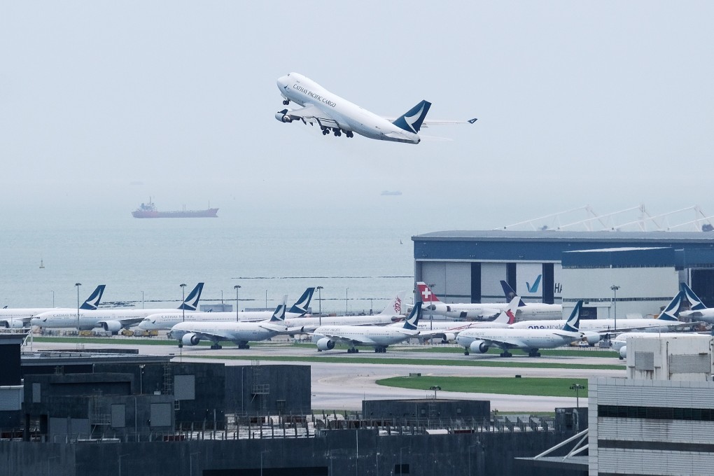 A cargo aircraft operated by Cathay Pacific takes off from Hong Kong International Airport. Air traffic capacity – along with airmail service – has been affected by the pandemic. Photo: Bloomberg