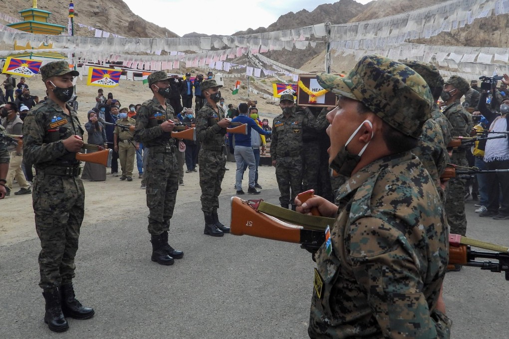 Indian soldiers pay their respects during the funeral of one of their comrades killed in a border clash with China. Photo: AFP