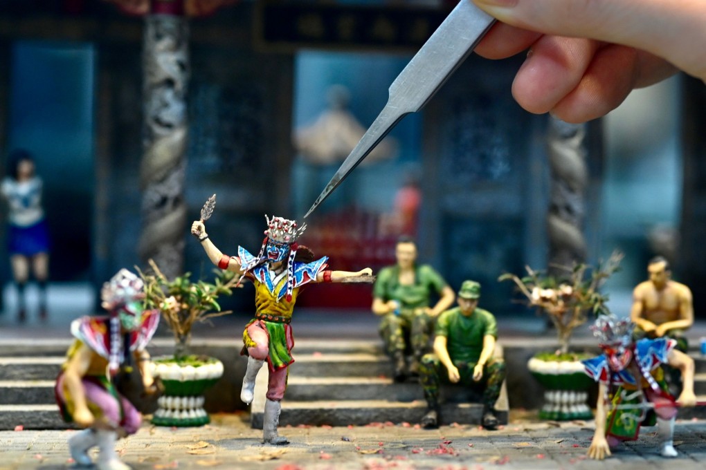 Miniature model artist Chen Shih-jen makes a big impact with his small worlds. Photo: AFP