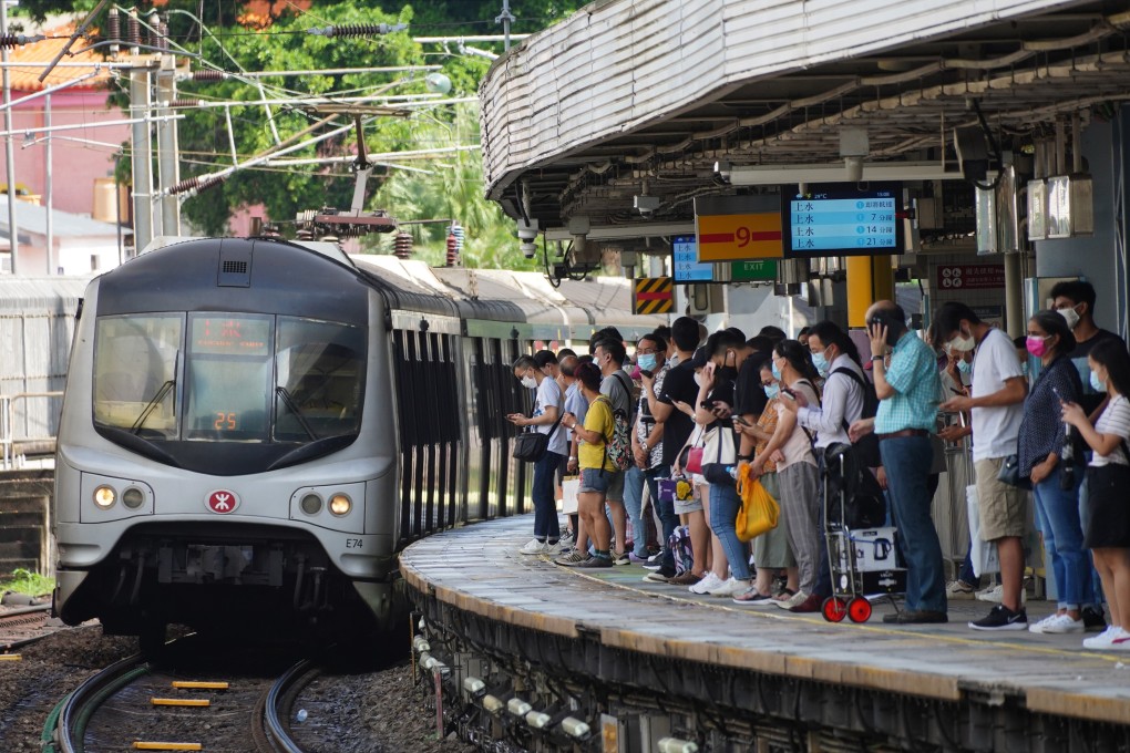 People stand on the platform at Kowloon Tong MTR station on the East Rail line. Photo: Sam Tsang