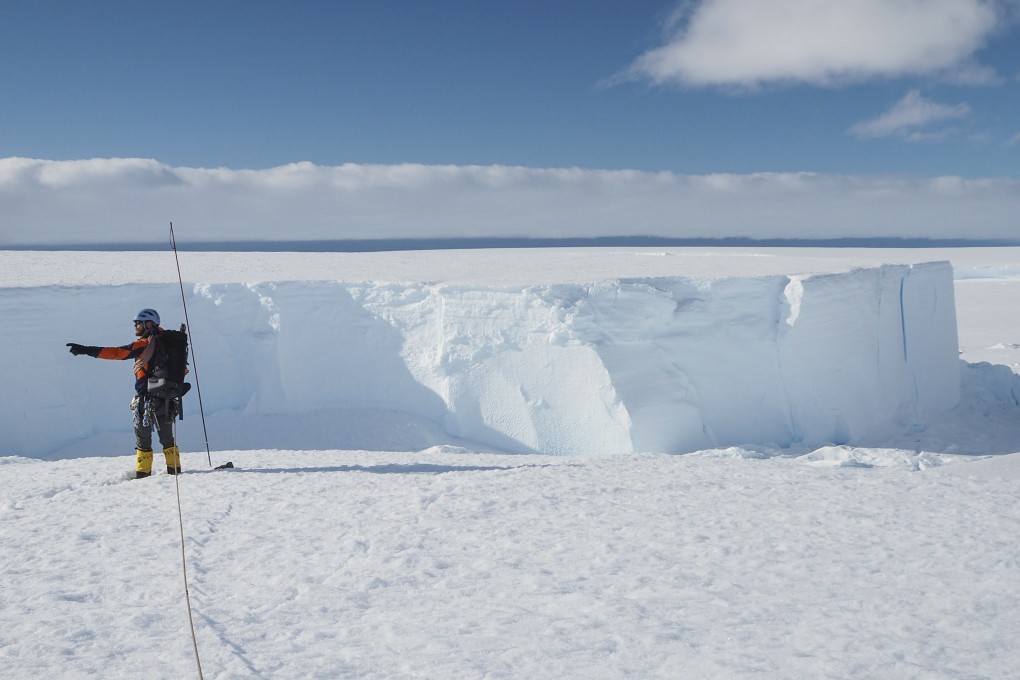 A field guide at the Brunt ice shelf in Antarctica in January 2020. Photo: Robert Taylor/British Antarctic Survey via AP
