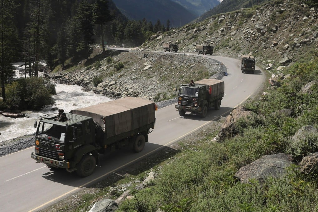 Indian army vehicles move along a highway leading to Ladakh. Photo: APA