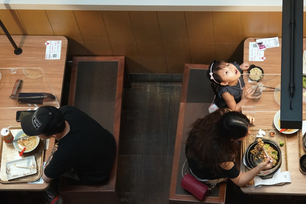 Customers eat lunch at a restaurant in Causeway Bay on Friday. Photo: Felix Wong