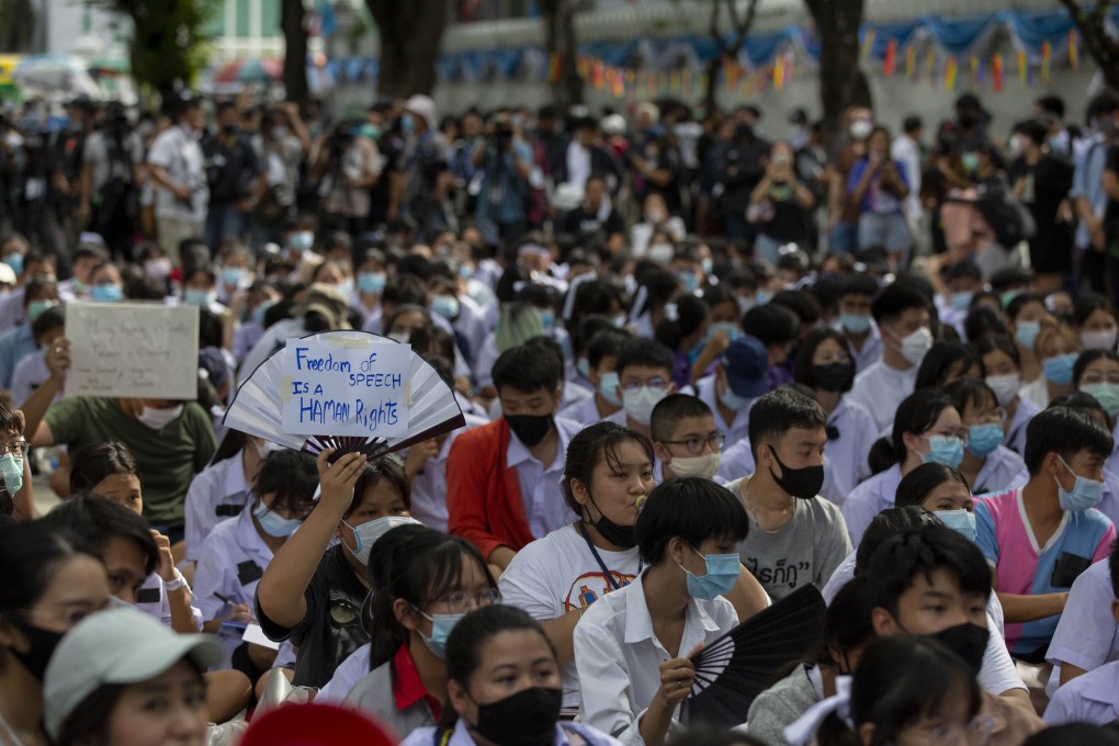 Students display placards during a protest in Bangkok. Photo: AP