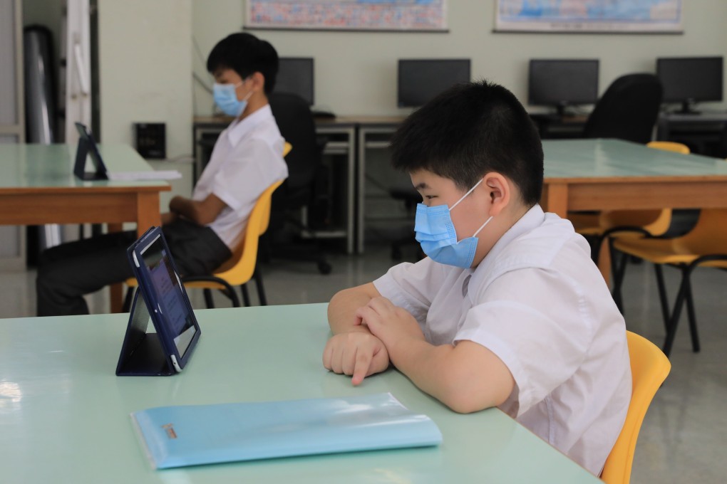 Secondary School students attend an online new school day open ceremony in Shek Kip Mei. Photo: May Tse