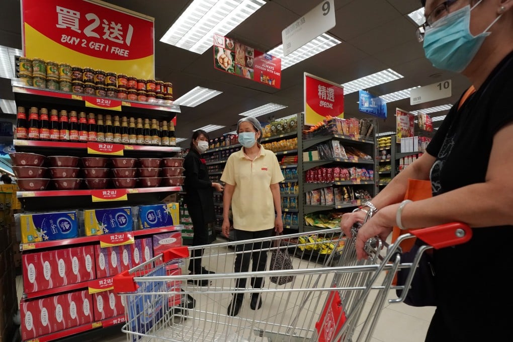Shoppers and staff at a Wellcome supermarket in Tseung Kwan O. Photo: Felix Wong