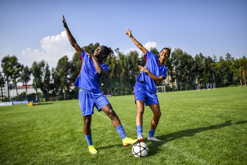 Camila Martins De Aguiar (right) poses for a photo shoot with Shanghai Shenli teammate Barbra Banda. Camila was sent off in the top of the table clash against Wuhan Jiangda, starting a brawl. Photo: Xinhua