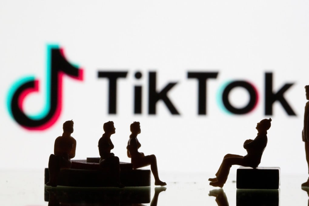 Small toy figures are seen in front of a Tiktok logo in this illustration taken, September 9, 2020. Photo: Reuters