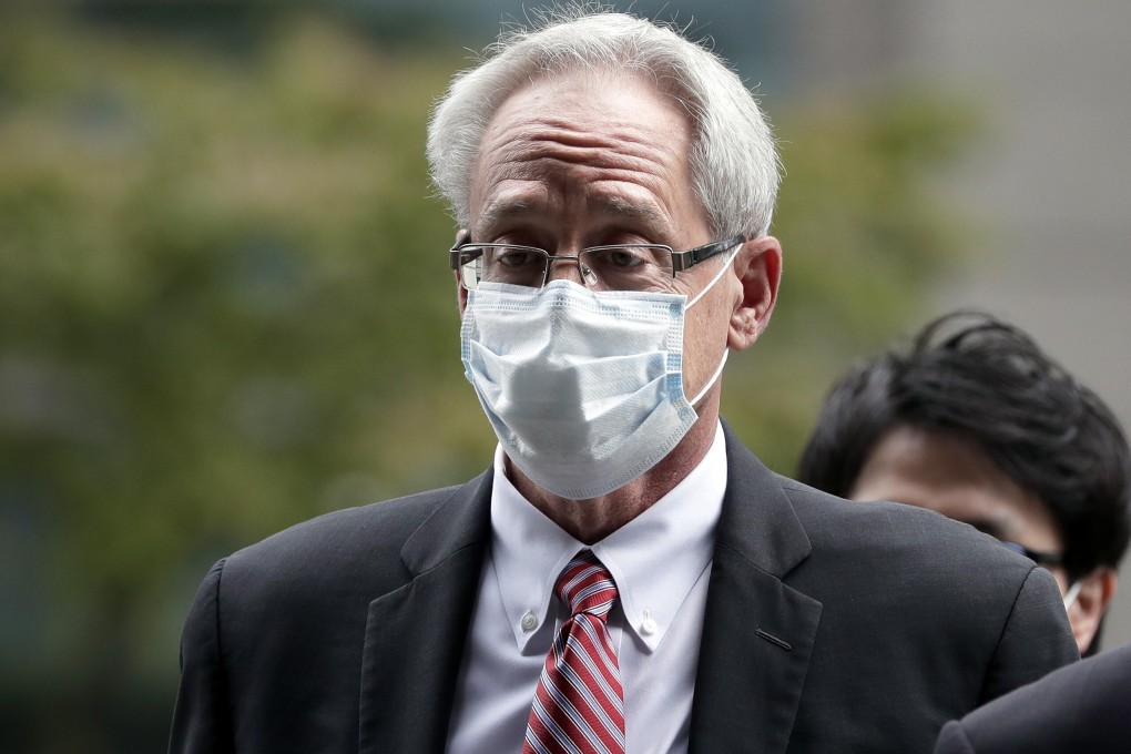 Former Nissan executive Greg Kelly arrives for the first hearing in his financial misconduct trial at the Tokyo District Court on Tuesday. Photo: AP
