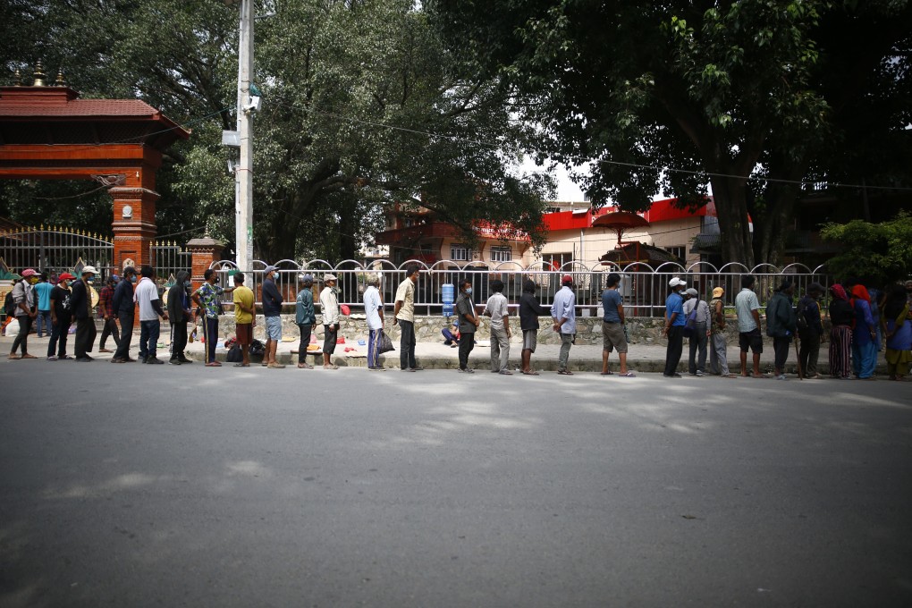 Across the world, the virus has deepened social and economic inequality in areas like education, pay and health care access. Photo: DPA