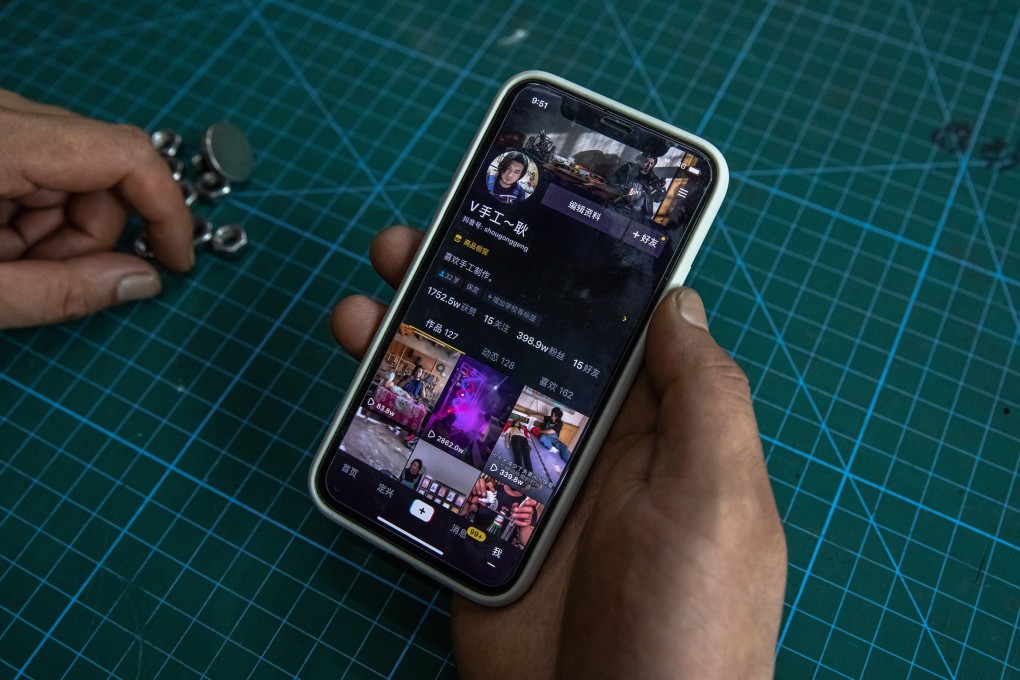 A Douyin user shows his profile with almost 4 million fans, at his workshop in Baoding city, Hebei province, China on 15 August 2020. Photo: EPA-EFE