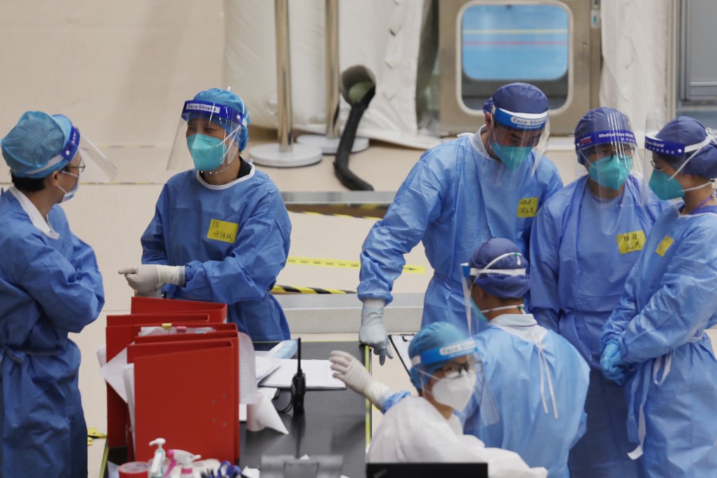 Health experts from mainland China on duty at Sun Yat Sen Memorial Park Sports Centre in Sai Ying Pun where a temporary air-inflated experimental laboratory was set up for Covid-19 testing, on September 12. Photo: Xiaomei Chen