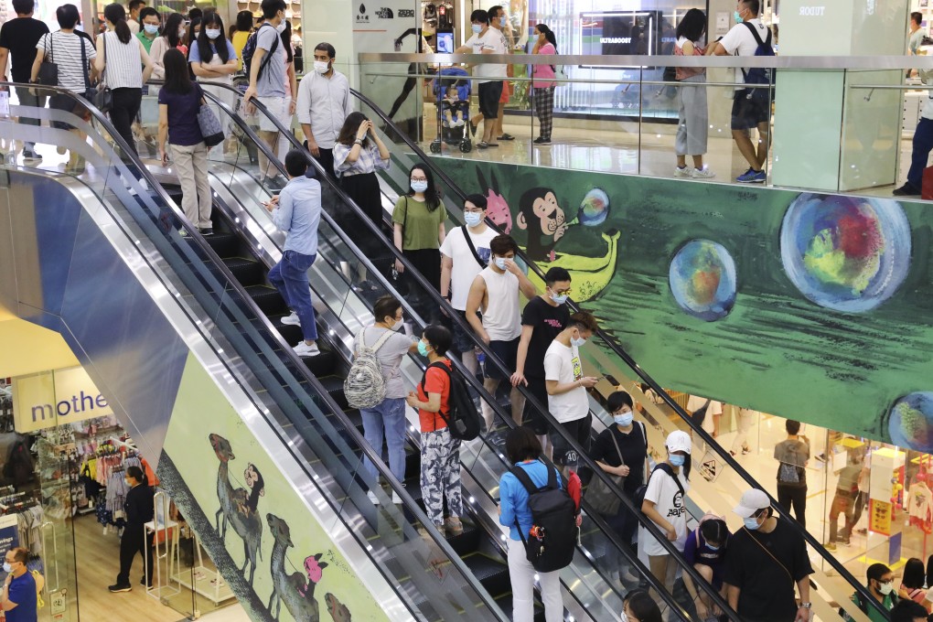 Harbour City shopping centre in Tsim Sha Tsui is packed with shoppers on Sunday as social-distancing rules are relaxed. Photo: Dickson Lee