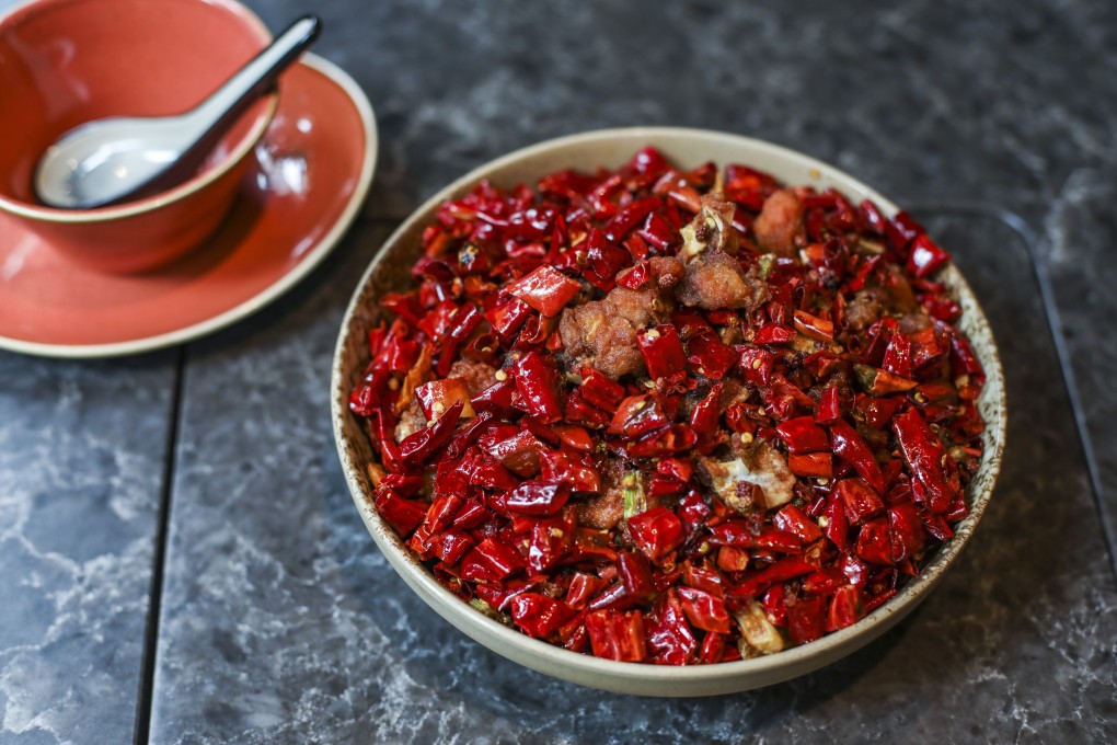 Crispy diced chicken with dried chillies and Sichuan peppercorns at Sichuan Lab in Wan Chai, Hong Kong. The spicier the food the better for senior marketing communications manager Catherine Yuen. Photo: Xiaomei Chen