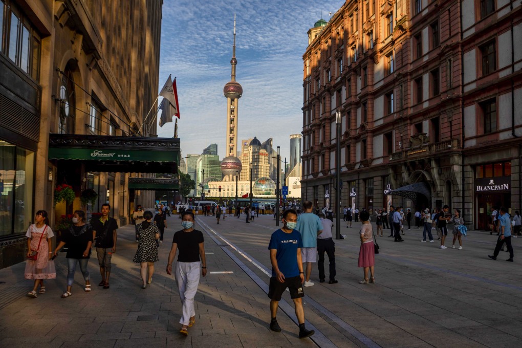 People walk in Shanghai’s main pedestrian street. Under the “dual circulation” economic model, China will rely more heavily on domestic consumption. Photo: EPA-EFE