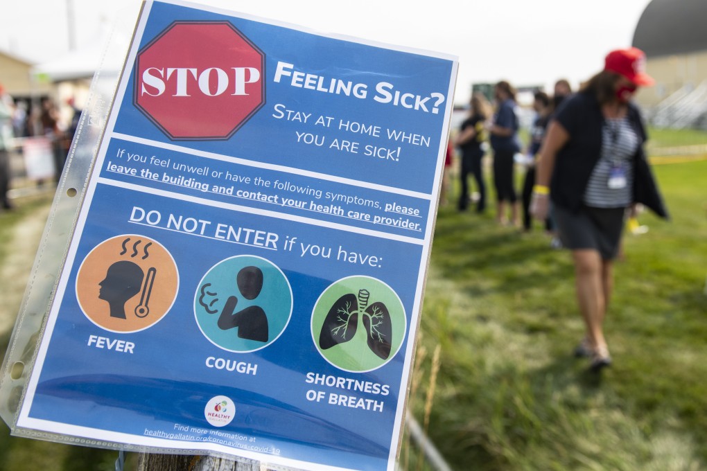 A warning sign outside a Republican campaign rally in Belgrade, Montana. The US leads with the world in Covid-19 deaths at almost 200,000. Photo: AP