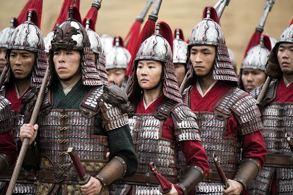Yifei Liu (centre) plays the title role in the film “Mulan”. Photo: Disney via AP