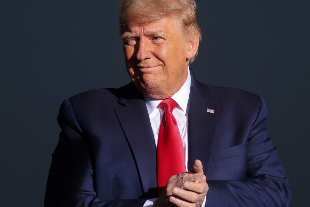 US President Donald Trump winks at someone in the crowd in Minden, Nevada. Photo: Reuters