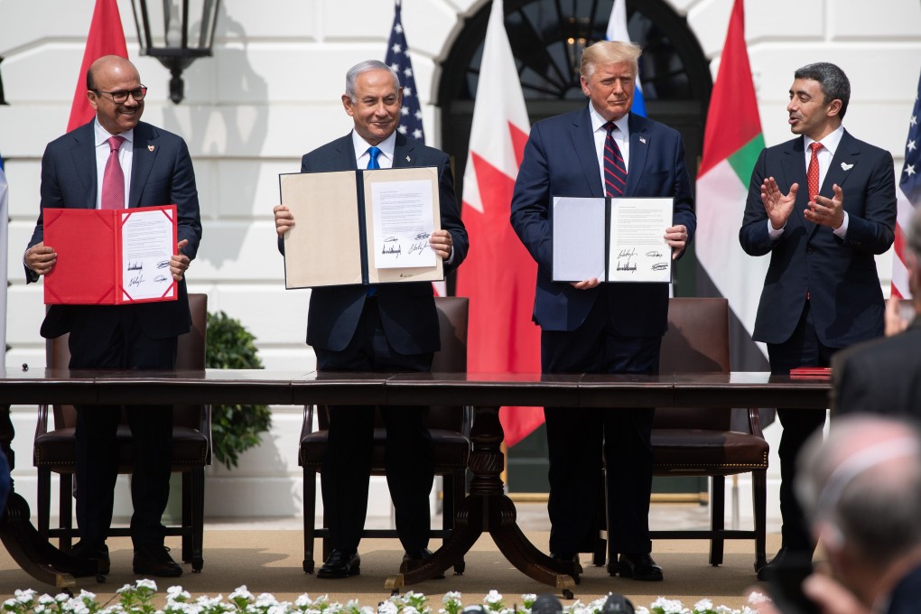 (From left) Bahrain Foreign Minister Abdullatif al-Zayani, Israeli Prime Minister Benjamin Netanyahu, US President Donald Trump and UAE Foreign Minister Abdullah bin Zayed Al-Nahyan take part in the signing of the Abraham Accords in Washington on Tuesday. Photo: AFP