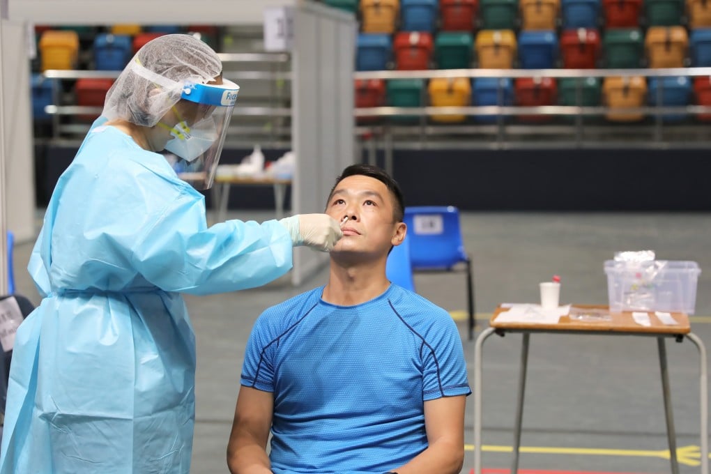 A resident takes a Covid-19 test as part of a mass screening programme in Hong Kong, on September 1. Photo: Xinhua