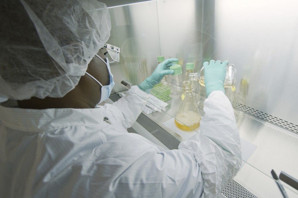 A researcher tests possible Covid-19 antibodies at a laboratory in Indianapolis. Eli Lilly said interim trial results suggested its antibody drug may reduce the need for hospital treatment in some patients. Photo: AP/Eli Lilly