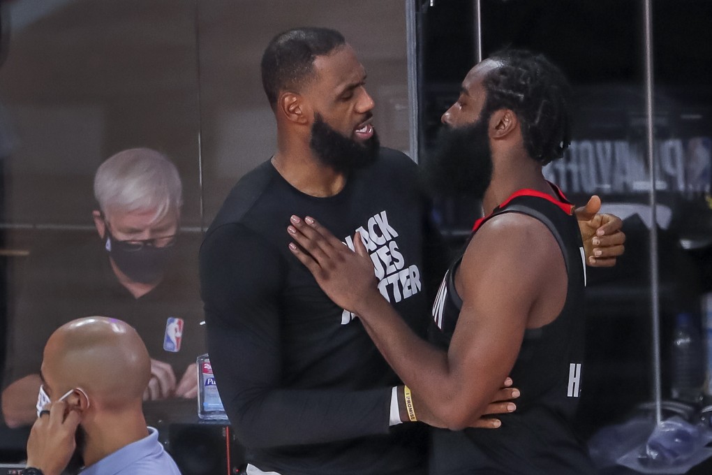 Los Angeles Lakers forward LeBron James (left) greets Houston Rockets guard James Harden (right) after the Lakers defeated the Rockets in their NBA play-off game five. Photo: EPA