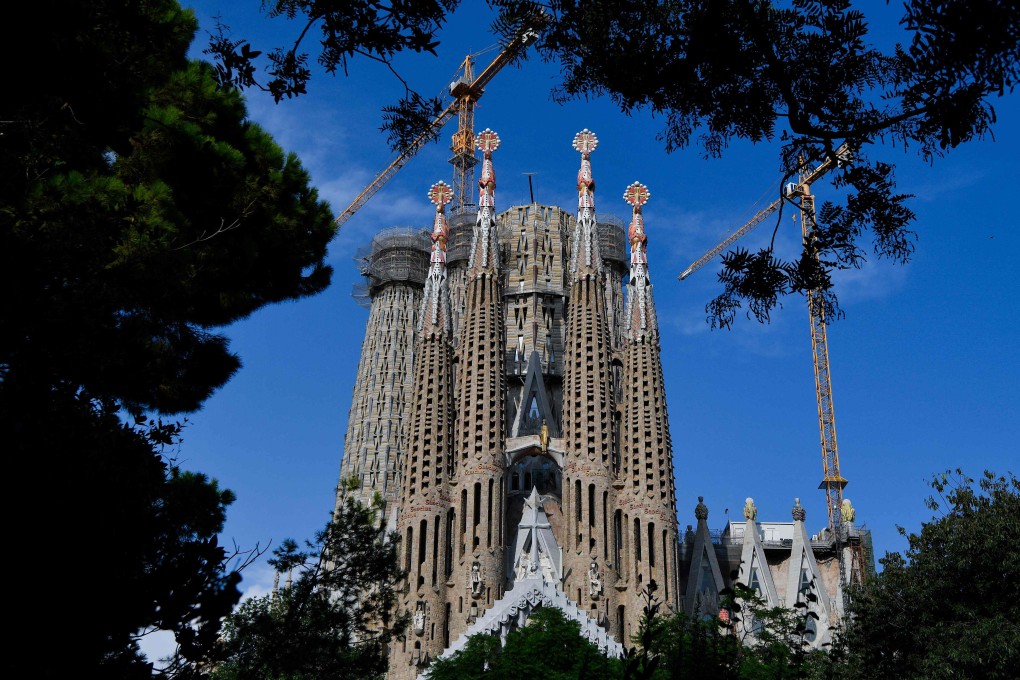 The ornate Sagrada Familia, which was designed by modernist Catalan architect Antoni Gaudi. Construction began 140 years ago and was due for completion in 2016 to mark the 100th anniversary of Gaudi’s death. Picture: AFP