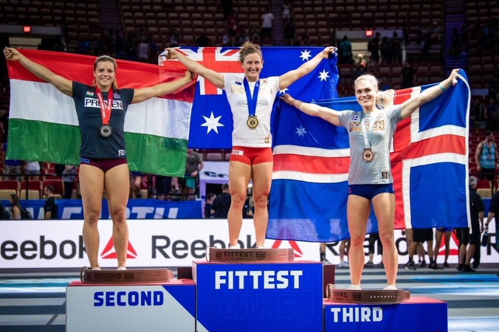 Tia Toomey, Laura Horvath and Katrin Davidsdottir on the women's podium in 2018, a very different view to the online version in this year’s Covid-19 pandemic. Photo: CrossFit