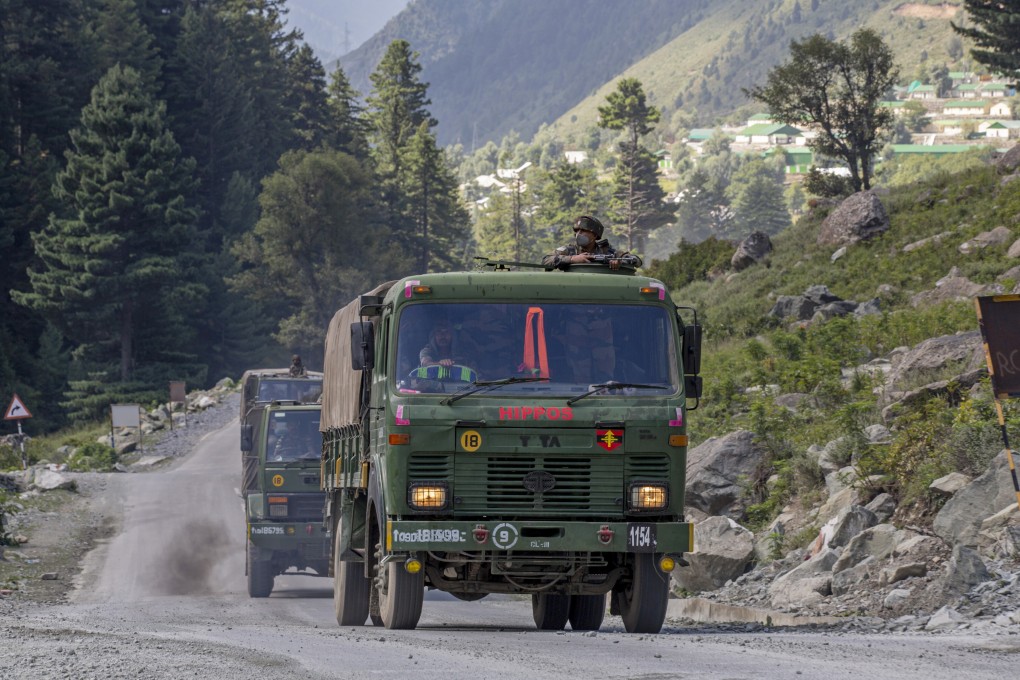 An Indian army convoy travels along the Srinagar-Ladakh highway at Gagangeer in Kashmir. China and India remain locked in a stand-off on their disputed border. Photo: AP