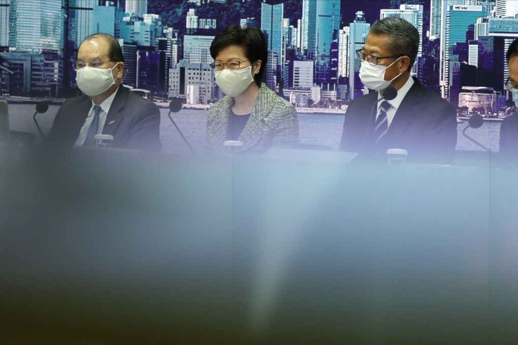 From left: Matthew Cheung, Chief Secretary for Administration; Carrie Lam, Chief Executive; Paul Chan, Financial Secretary; and Patrick Nip Tak-kuen, Secretary for the Civil Service, meet the press at the Central Government Offices in Tamar to discuss relief measures under the third round of the Anti-epidemic Fund. Photo: Nora Tam