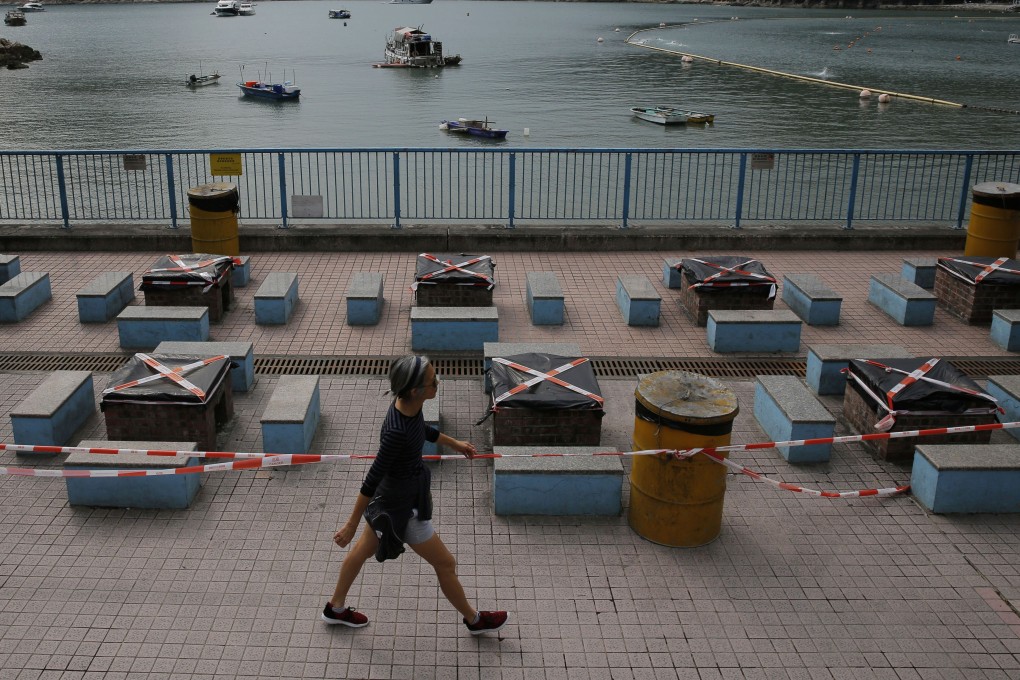 Barbecue pits are closed at a beach on April 8. Hong Kong’s beaches remain shut although swimming pools have now been reopened. Photo: AP