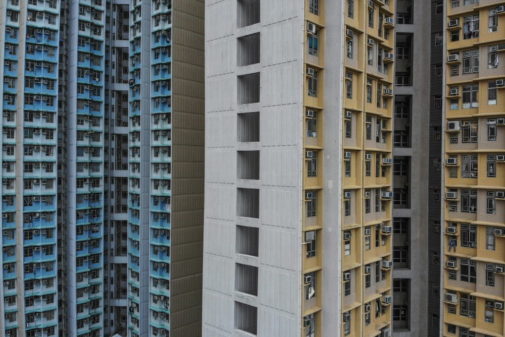 A public housing estate (left) stands next to Home Ownership Scheme housing in Shau Kei Wan in January 2019. Photo: Martin Chan