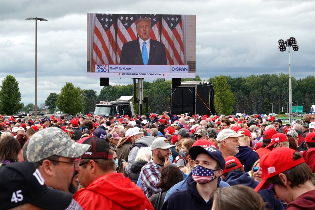 Supporters wait in line to enter a rally held by US President Donald Trump in Freeland, Michigan, the US. The Rolling Stones and Neil Young have reacted angrily to their songs being played at his campaign rallies. Photo: Getty Images