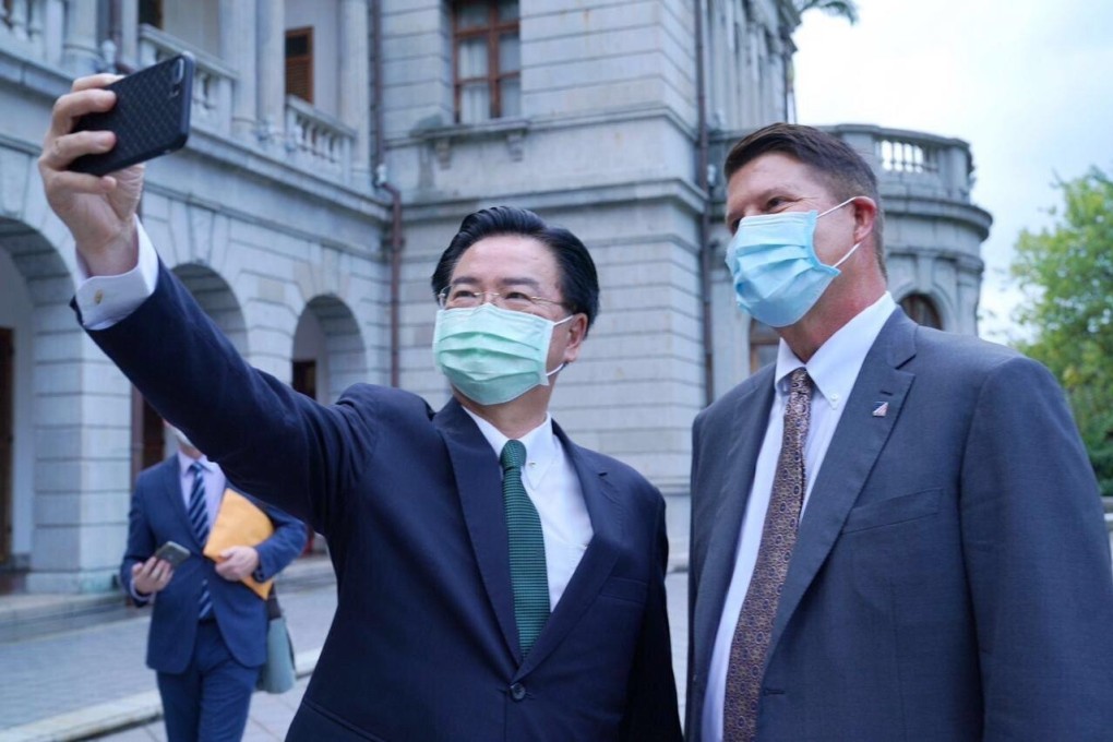Taiwanese Foreign Minister Joseph Wu takes a selfie with US undersecretary of state Keith Krach in Taipei on Friday. Photo: EPA-EFE