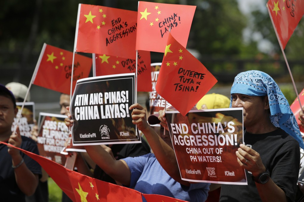 Protesters rally on June 18, 2019 to condemn an incident that involved a Chinese fishing vessel hitting a Filipino fishing boat. Photo: AP
