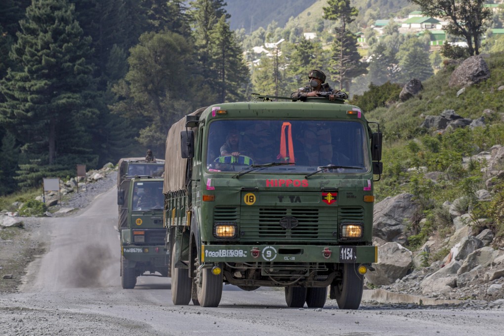 An Indian army convoy seen at the Srinagar-Ladakh highway near the border. Photo: AP