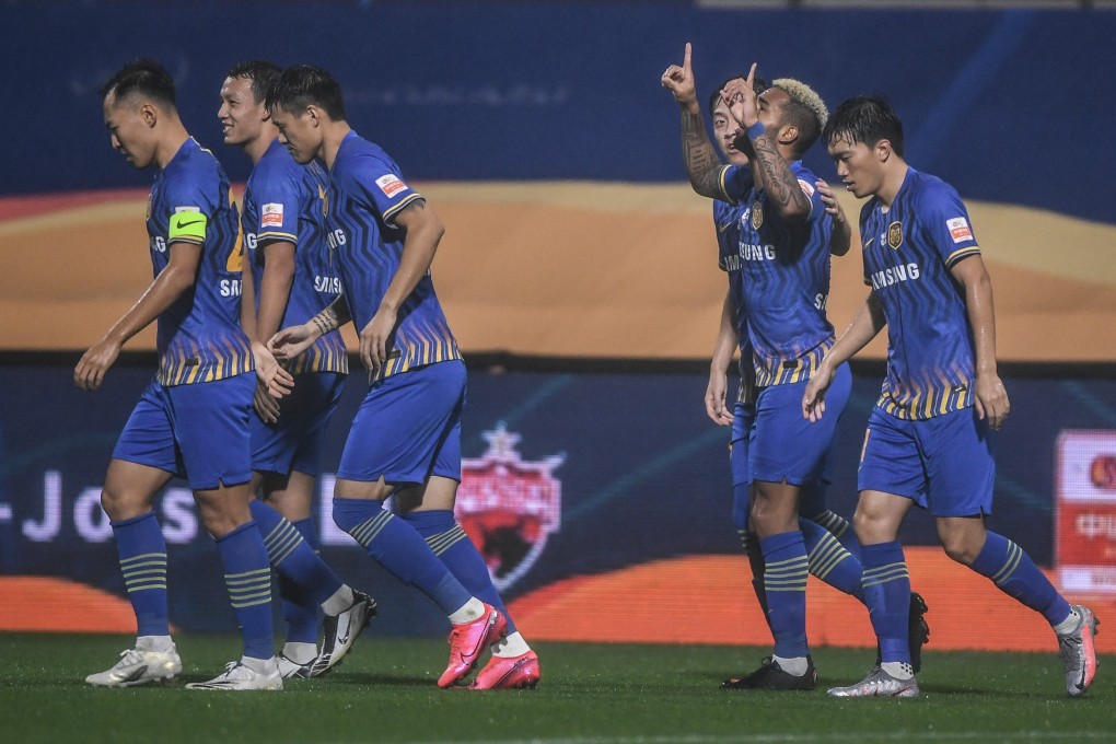 Alex Teixeira (second from right) of Jiangsu Suning celebrates a goal during the 2020 Chinese Super League season. Photo: Xinhua