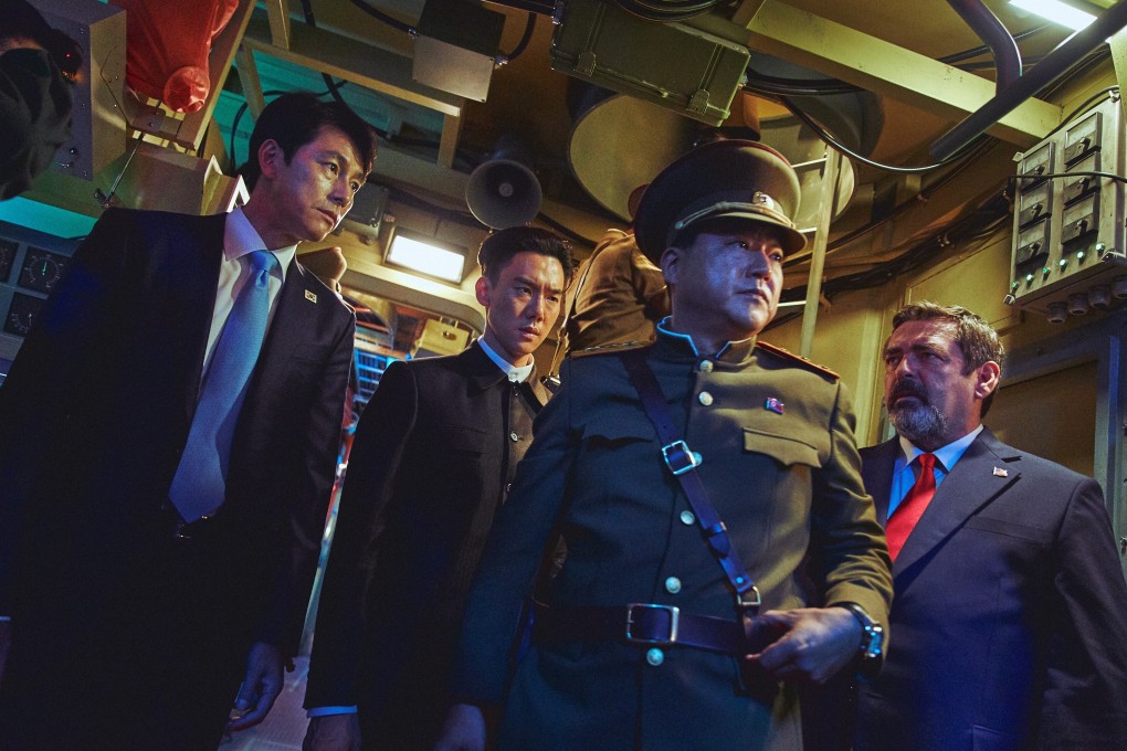 Jung Woo-sung (left), Kwak Do-won (front) and Angus Macfadyen in a still from Steel Rain 2: Summit (category IIB; Korean, English), directed by Yang Woo-seok.