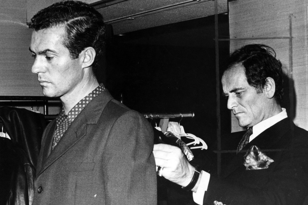 A model is fitted by fashion designer Pierre Cardin for the Hong Kong show in 1968. Photo: SCMP