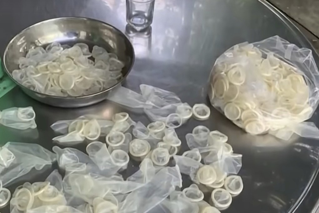 Used condoms that have been washed and reshaped are packed for sale in Vietnam. Photo: AP