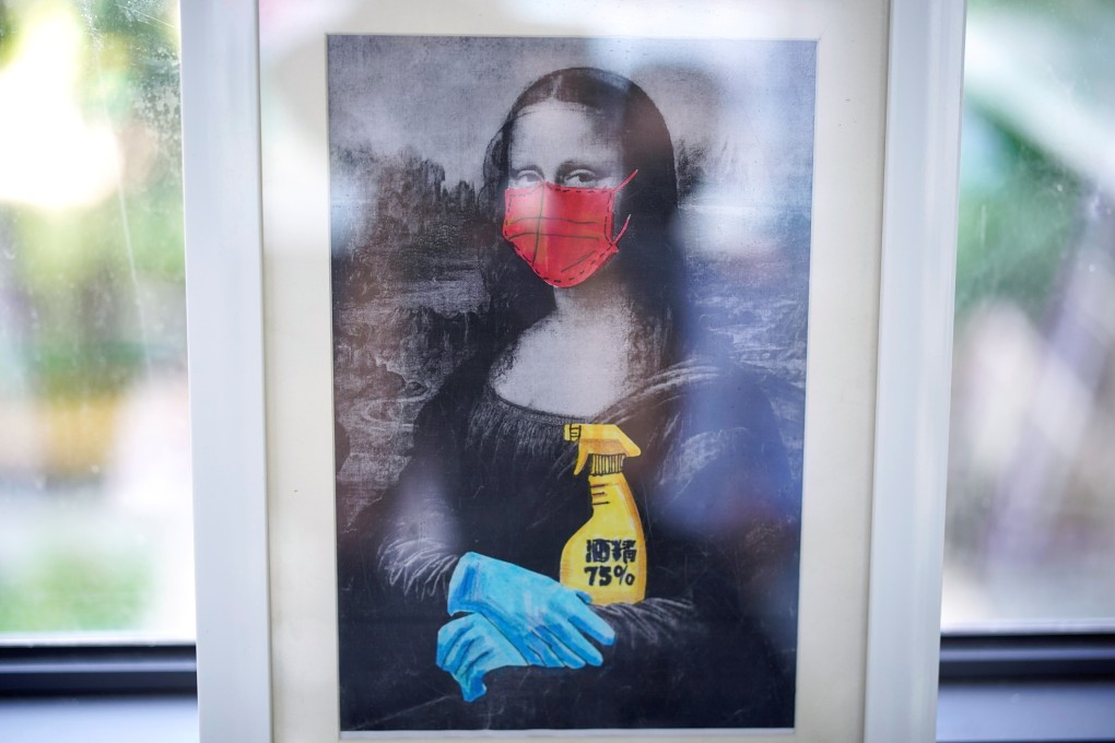 A painting depicting the Mona Lisa wearing a face mask and gloves is pictured at Changchun Street Primary School in Wuhan on September 4. Photo: Reuters