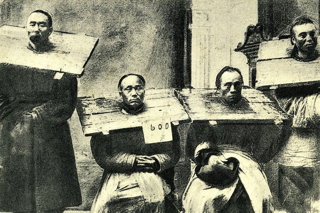 Prisoners in early 20th century China. Photo: Getty Images